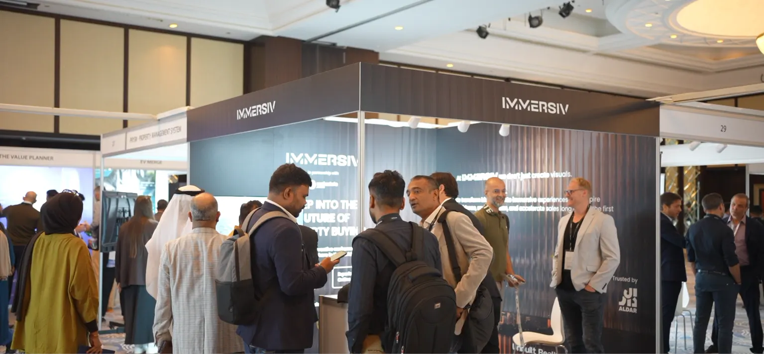 Delegates gathered at an exhibitor stand at Future PropTech